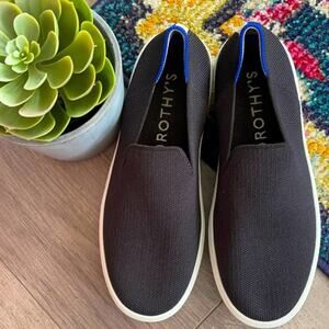 Rothys size 5.5 slides on woman’s black sneakers